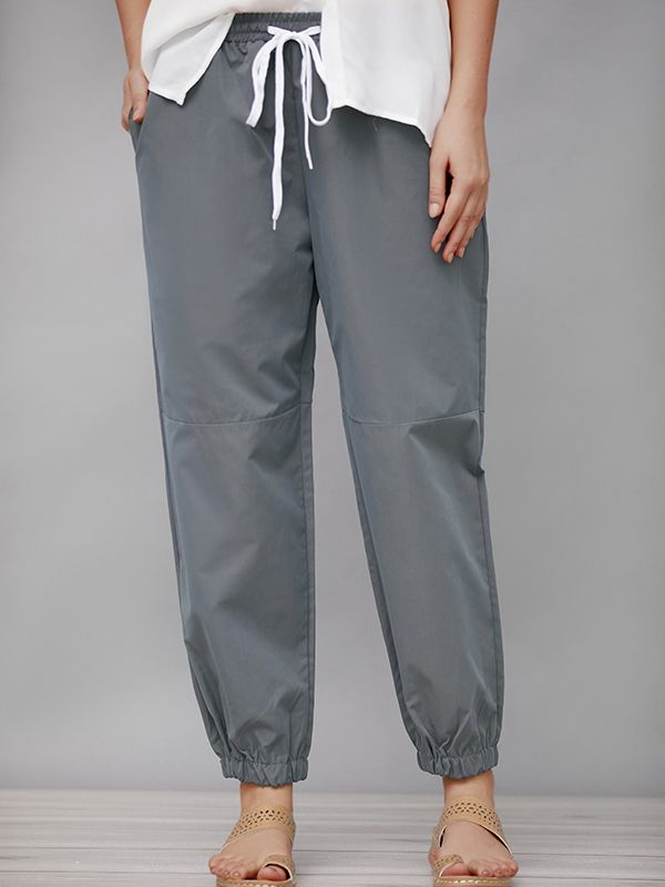 Grey Solid Sashes with Pockets Casual Sweatpant Spring Leisure Joggers With Drawstring, Spring Drawstring Ankle-length Joggers, Spring Ankle-length Drawstring Joggers, Spring Ankle-length Joggers With Drawstring, Trendy Gray Pants With Drawstring, Gray Stretch Bottoms With Drawstring, Gray Drawstring Sweatpants For Spring, Spring Leisure Pants With Elastic Cuffs, Casual Ankle-length Joggers With Drawstring