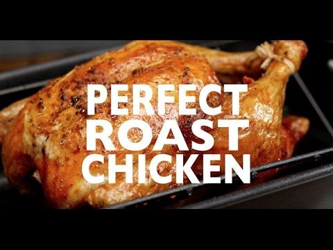 a roasted chicken in a roasting pan with the words perfect roast chicken on it