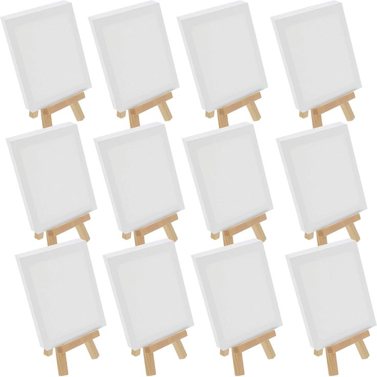 twelve wooden eases with white canvases on them