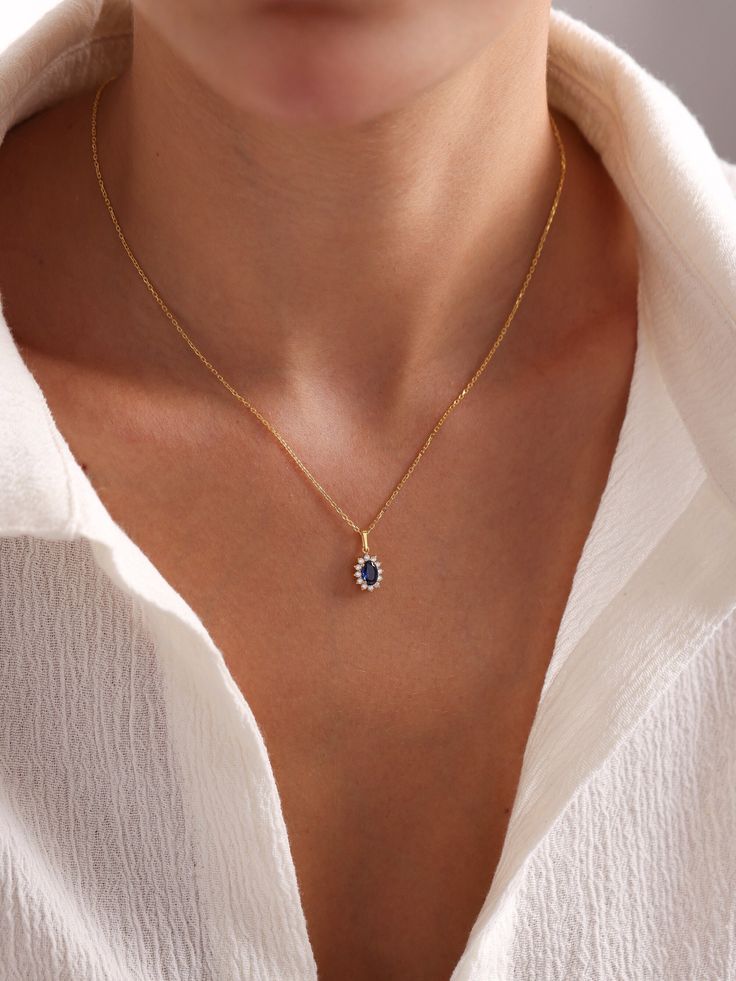 Your Blue Sapphire Oval Pendant is stylish, dainty and pretty ideal for everyday use. Details of solid gold handmade Minimalist Sapphire Necklace are very eye-catching. It is a great gift for your loved ones. This jewelry will be an indispensable piece of yours. This meaningful Sapphire Halo Necklace with high quality handwork will be a legacy you can leave to your family its.  * Gold Sapphire Necklace Details * Material / Gold Kt:  14K (585), 18K (750), 8K (333) * Available Gold Colors: Yellow Sapphire Jewelry The Natural Sapphire Company, Sapphire Pendant Necklace Vintage, Small Sapphire Necklace, Sapphire Wedding Necklace, Blue Gold Necklace, Dainty Oval Sapphire Jewelry, Blue Oval Pendant Necklace In Dainty Style, Dainty Blue Oval Pendant Necklace, Blue Dainty Oval Pendant Necklace