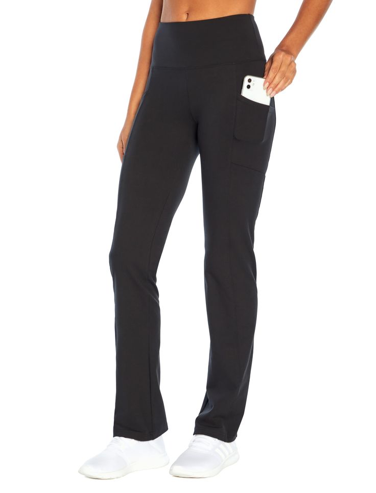 PRICES MAY VARY. High-rise, full length bootleg yoga pant with a 4 inch curved waistband lined with Powermesh for tummy control and slimming compression. Self-side seam pockets allow you to carry small personal items. Made of Stretch Opatek Luxe: The fabric is a double-knit, full coverage with no-show opacity, moisture-wicking fabric that provides a soft brushed finish for superior comfort and accelerated drying. Reflective logo detail. Inseam: 32 inches Black Travel Pants Outfit, Travel Pants Outfit, Curved Waistband, Bootleg Pants, Travel Pants, Black Travel, Yoga Pant, Double Knit, Stretch Pants