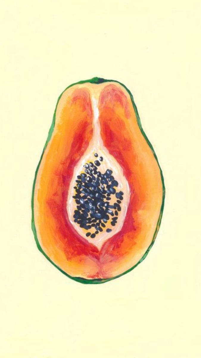 a drawing of a papaya cut in half on a yellow background with black seeds