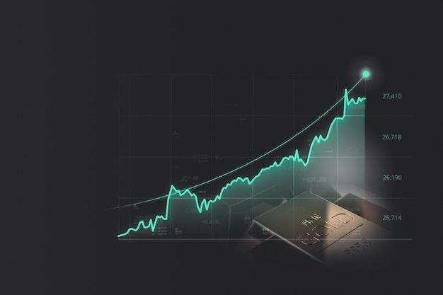 an upward graph with a lit candle on it and a cell phone in the foreground