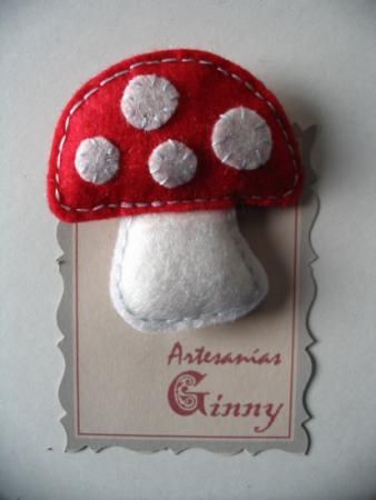 a close up of a small mushroom on a card