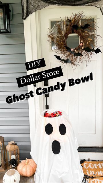 a ghost candy bowl sitting on top of a table in front of a door with the words diy dollar store ghost candy bowl