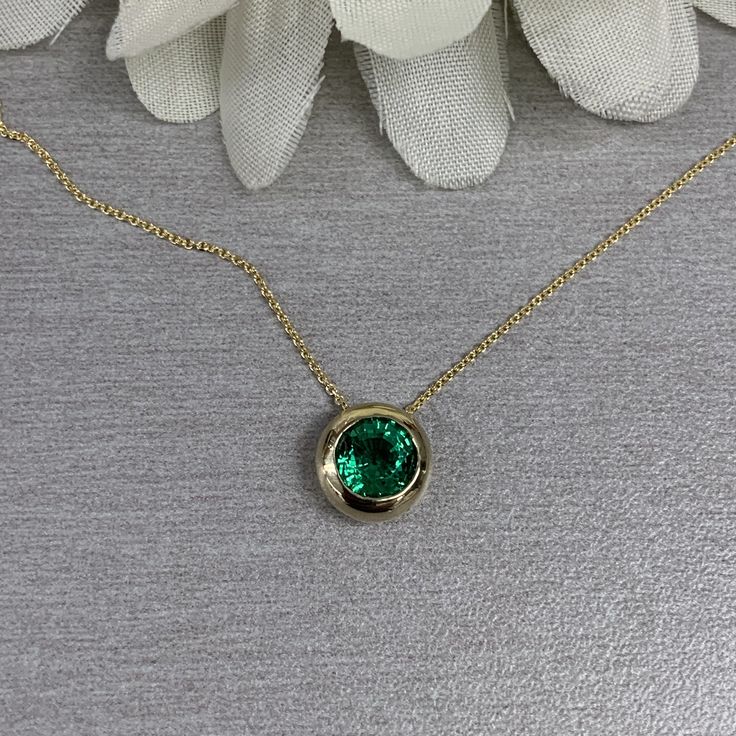 Round Emerald Pendant Necklace 14k Yellow Gold, Emerald Bezel Necklace, May Birthstone Necklace, Dainty Emerald Necklace For Ladies, #6750 #BezelNecklace #DaintyNecklace #6750 #RoundEmerald #EmeraldNecklace #ForLadies #MayBirthstone #BezelEmerald #14kYellowGold #PendantNecklace Formal Emerald Necklace With Bezel Setting, Formal Round Emerald Necklaces, Classic Emerald Necklaces With Bezel Setting, Classic Emerald Pendant Necklace In Bezel Setting, Classic Emerald Pendant Necklace With Bezel Setting, Classic Emerald Necklace In 14k Gold With Bezel Setting, Classic Bezel Set Emerald Pendant Necklace, Formal Round Emerald Necklace Fine Jewelry, Formal Round Emerald Necklace