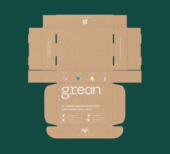 an open cardboard box with the words green printed on it's front and side