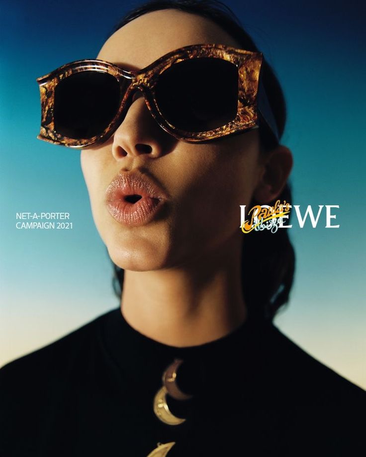 a woman with sunglasses on her face and the words love me written in front of her