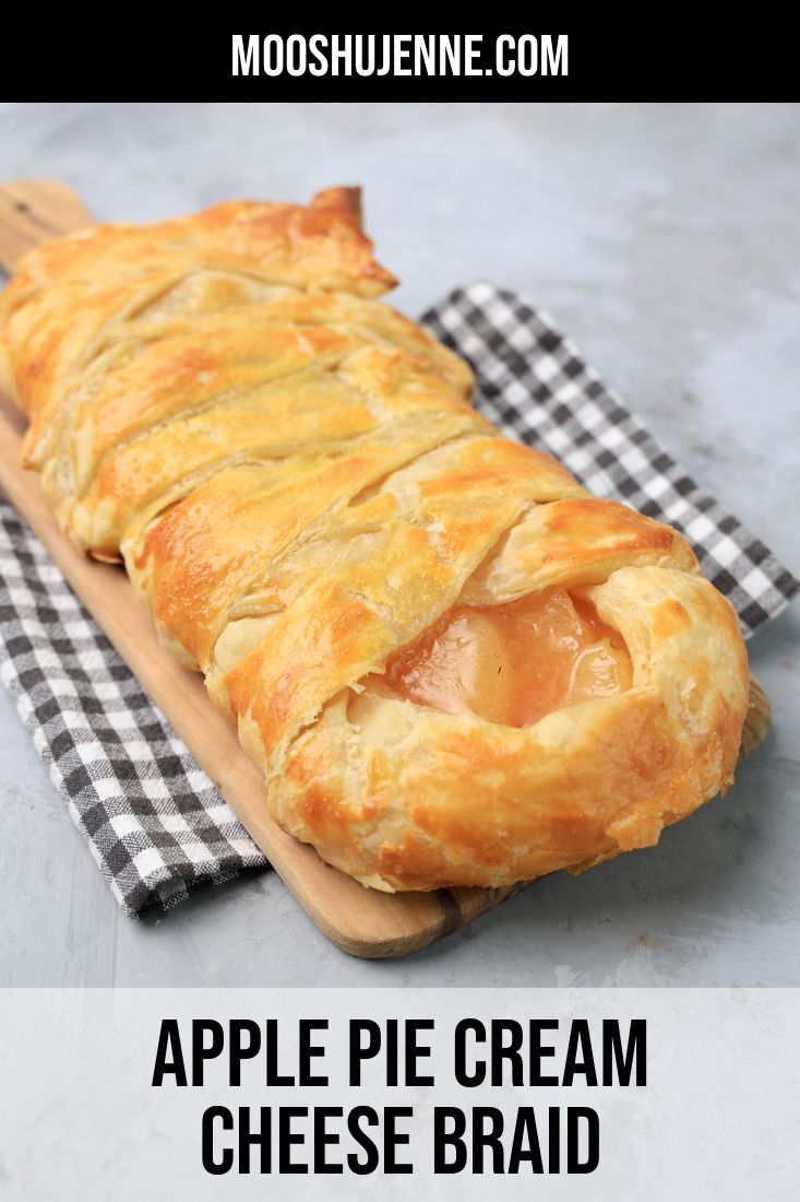 an apple pie cream cheese braid on a cutting board