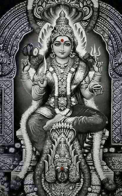 the hindu god sitting on top of a throne with two hands in each hand and holding a