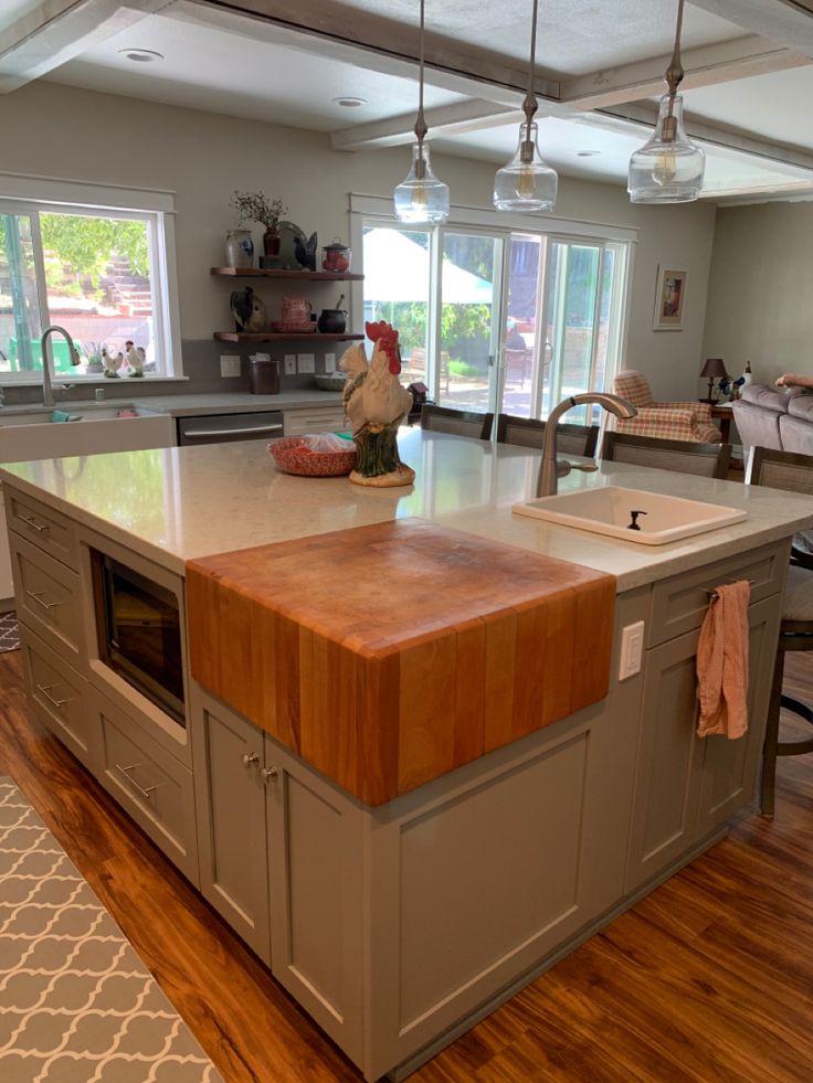 a large kitchen island in the middle of a room