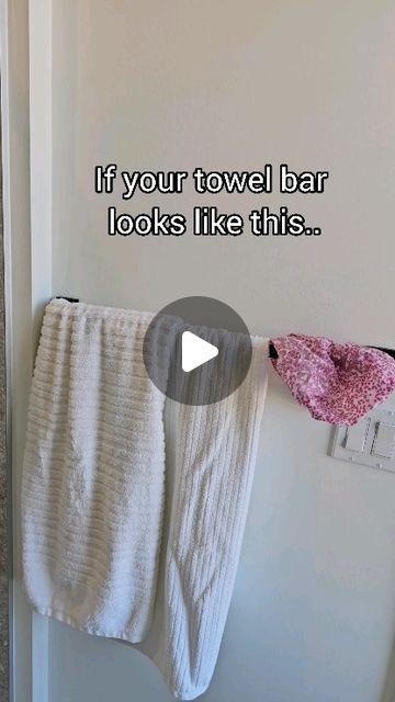 a towel rack with towels hanging on it