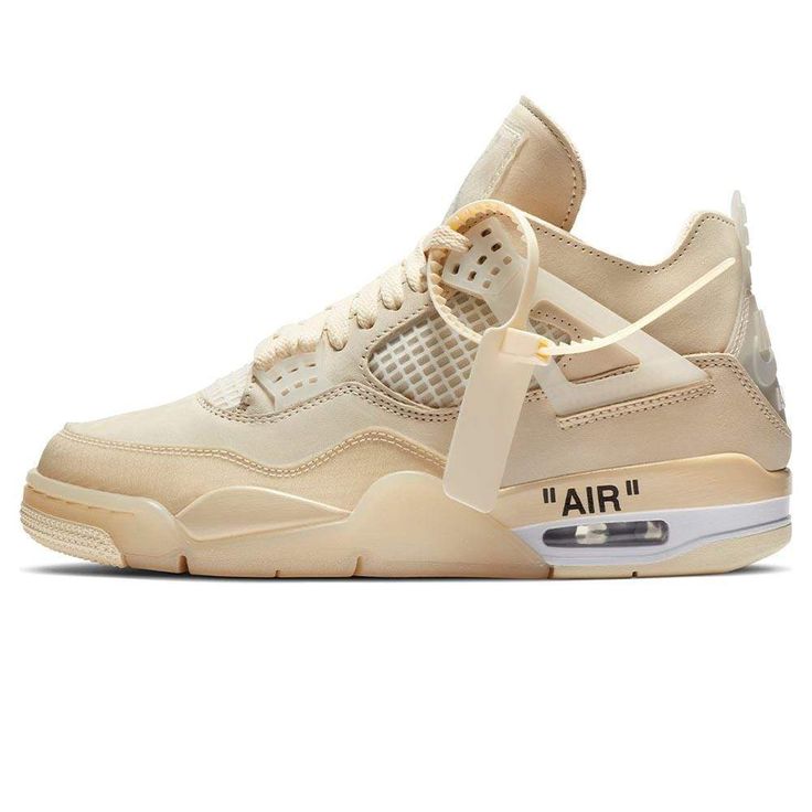 Made in collaboration with Virgil Abloh’s luxury streetwear brand, the OFF-WHITE x women’s Air Jordan 4 SP ‘Sail’ delivers a subdued take on the classic silhouette. The deconstructed leather build is rendered in a monochromatic off-white finish, complete with semi-translucent TPU detailing on the molded eyelets, structural ‘wings’ and Nike Air-branded heel panel. Abloh’s signature flourishes include a tonal zip tie and ‘AIR’ printed above the visible Air sole unit. Sepatu Air Jordan, Retro Jordans, New Basketball Shoes, Air Jordan Retro 4, Air Jordan Iv, Jordan Iv, High Top Basketball Shoes, Nike Air Jordan 4, Jordan Retro 4