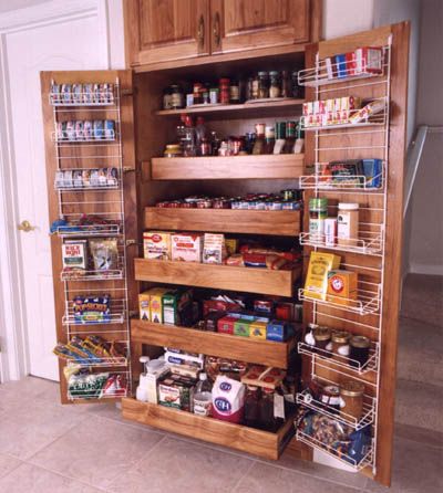 an open pantry with lots of food in it