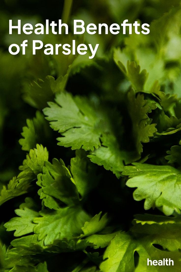 green leaves with the words health benefits of parsley on it in white text overlay