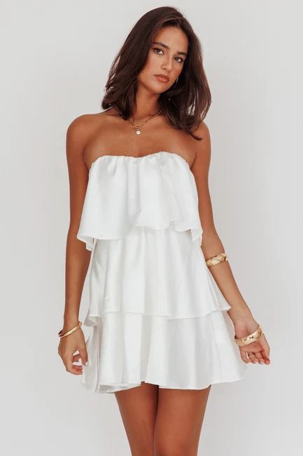 Shop the Behati Tiered Layer Strapless Dress White | Selfie Leslie Elegant Layered Mini Dress, Chic Strapless Tiered Dress With Ruffle Hem, Flirty Strapless Ruffled Dress For Vacation, Elegant Summer Strapless Dress With Ruffles, Elegant Strapless Summer Dress With Ruffles, Chic Fitted Layered Mini Dress, Chic Layered Fitted Mini Dress, Layered Fitted Dress For Summer, Chic Mini Dress With Sweetheart Neckline For Vacation