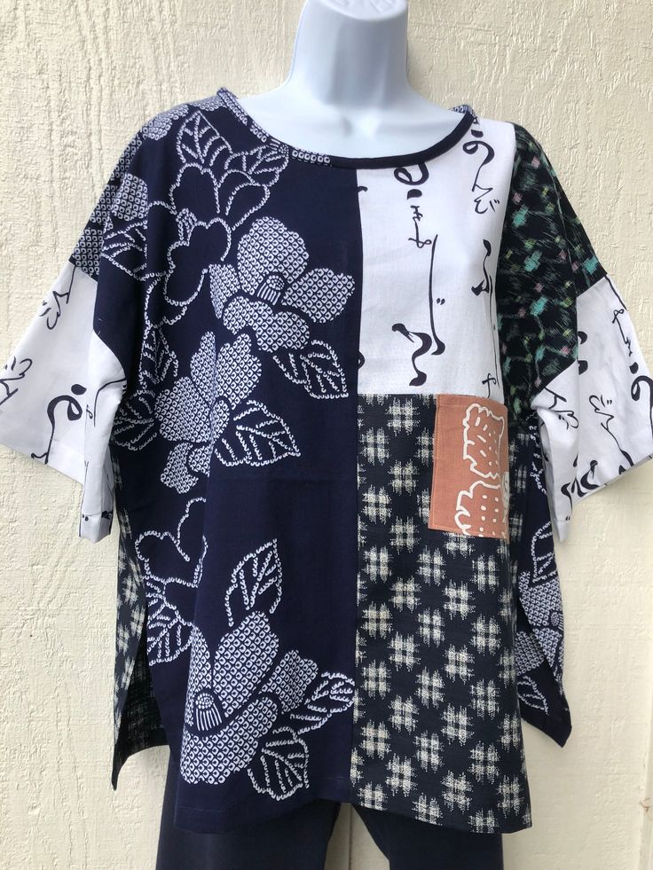 One of a kind mixed yukata and kasuri cotton top.  Very comfortable soft cotton in attractive magnolia and kanji designs .  One only in size M.  Measurements are given in one of photos. Quilt Jackets, Collage Fabric, Wearable Art Clothing, Recycled Clothing, Art Clothing, Fabric Designs, Women's Blouses, Upcycled Fashion, Recycle Clothes