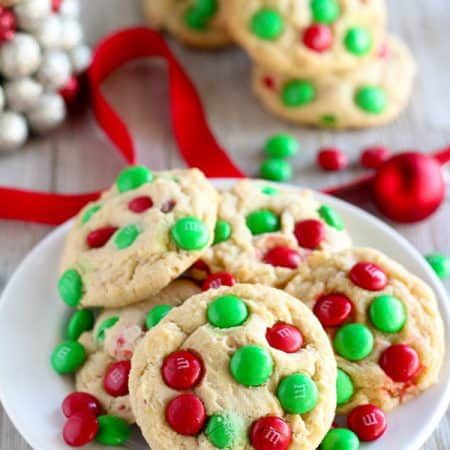 white plate with cookies and candy on it