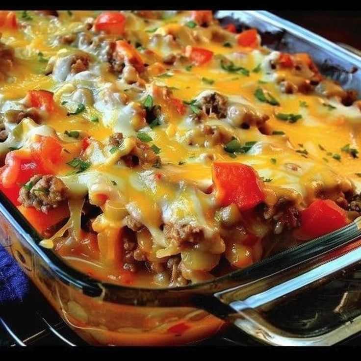 a casserole dish filled with meat and vegetables