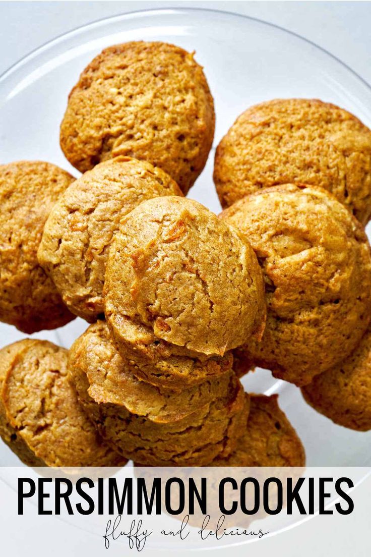 a glass plate filled with pumpkin cookies on top of a white tablecloth and text overlay that reads, persimmon cookies