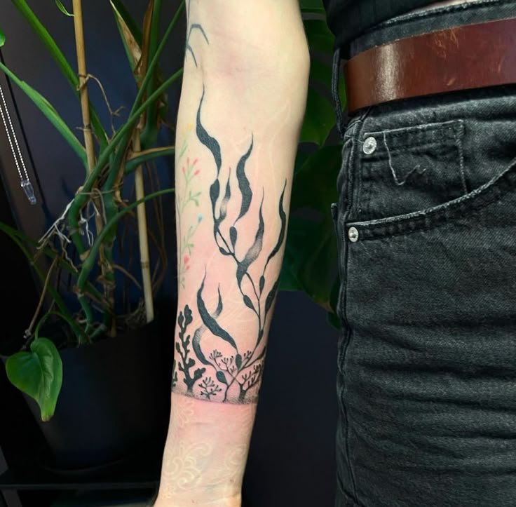 a person with a tattoo on their arm