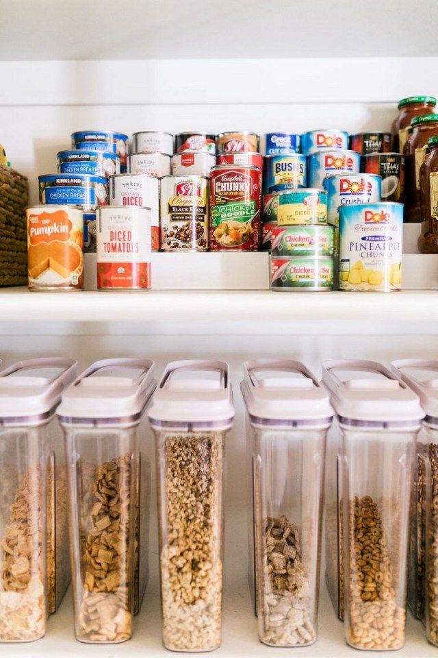 an organized pantry filled with food and containers for storing cereals, nuts, and other things