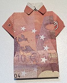 an origami shirt made out of money