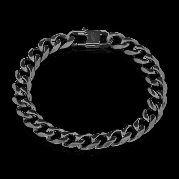 Material: Stainless Steel Color: Black Length: 9in Width: 0.5inWeight: 36grams 3-Year Warranty on All Watches Free Ground Shipping On Orders $149+ All Orders Ship Same Day or Next Day *In some instances, the colors in the images may slightly differ from the real product. Classic Black Chain Bracelet For Everyday, Elegant Black Cuban Link Jewelry, Black Jewelry With Stainless Steel Clasp, Classic Adjustable Black Chain Bracelet, Classic Black Metal Chain Bracelet, Black Cuban Link Chain Bracelet, Adjustable Black Stainless Steel Cuban Link Bracelet, Classic Black Chain Jewelry, Classic Black Jewelry With Chain Detail