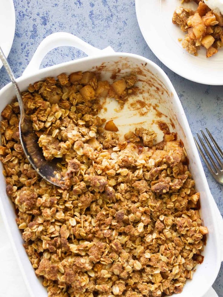 a white casserole dish filled with granola