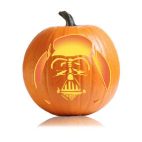 a pumpkin with a darth vader face carved into it