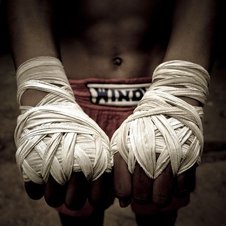 a person with bandages wrapped around their hands