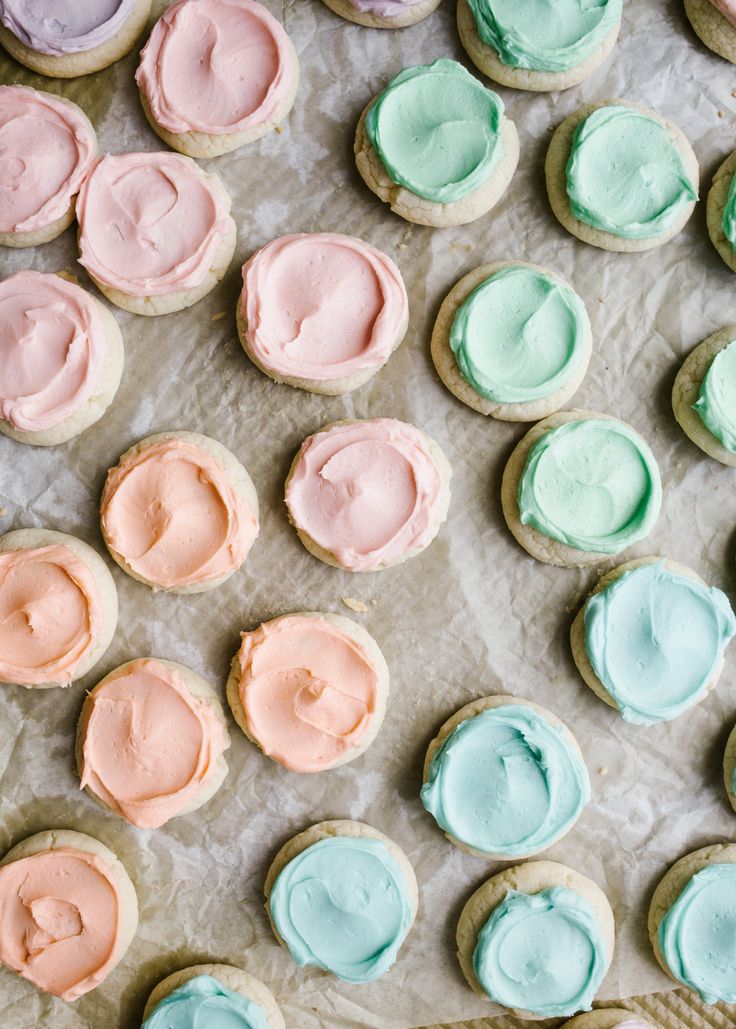 some cookies with frosting on top of them