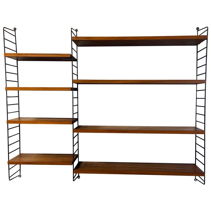 two shelving units with wooden shelves on each side