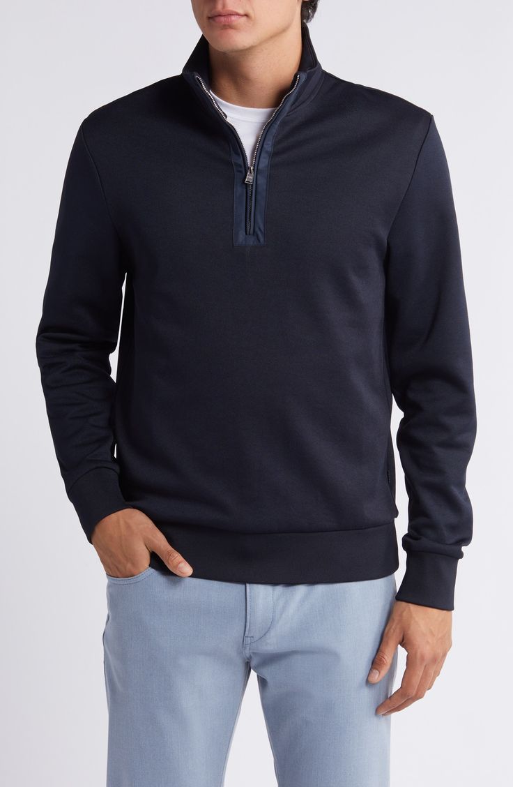 Classic and comfortable, this pullover made with breathable cotton sports a layerable fit and an adjustable front zipper that climbs to a tall collar. Quarter-zip closure Stand collar Long sleeves Banded cuffs and hem 53% cotton, 47% polyester Machine wash, line dry Imported Athleisure Half-zip Sweatshirt With Zipper Closure, Half-zip Sports Sweatshirt With Zipper, Half-zip Sweatshirt With Zipper For Sports, Half-zip Sweatshirt With Zipper Closure For Sports, Sportswear Tops With Half-zip Closure, Half-zip Sweatshirt With Ribbed Collar For Sports, Cotton Half-zip Sweatshirt With Zipper Closure, Cotton Half-zip Sweatshirt With Zipper, Navy Half-zip Sweatshirt For Fall