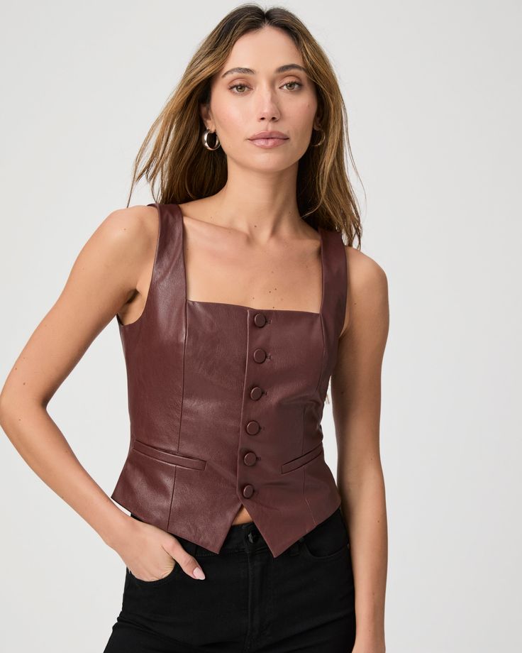 Crafted from our soft stretch faux leather, this sleeveless dark brown vest top is fitted throughout the body with front princess seams, a square neckline, a front notch, and welt pockets. | Irene Vest Top - Rum Raisin Faux Leather | Size 10 Chic Fitted Faux Leather Tops, Sleeveless Faux Leather Top For Night Out, Fitted Leather Vest For Fall, Fitted Faux Leather Top For Work, Sleeveless Leather Top For Night Out, Fitted Faux Leather Tops For Work, Chic Fitted Leather Vest, Chic Fitted Leather Top, Fitted Sleeveless Faux Leather Top