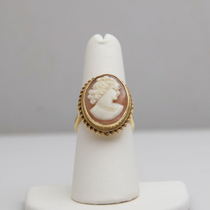 "For sale: (1) d696 Gorgeous 14k Yellow Gold Cameo Ring PLEASE READ ENTIRE DESCRIPTION BEFORE PURCHASING Pre-owned item. Good condition. Please see pictures for details. Sold as is, as seen on pictures. Specifics: 14k Yellow gold Size: 6.75 (U.S.) Width: 23.5 mm Total Weight: 6.7 grams Please be 100% sure of your purchase before buying, as we do not offer refunds. We are more than happy to provide any specific pictures, or answer any questions you have regarding our items. All jewelry is confirm Baby Gold Rings, Cameo Ring, Filigree Ring, Gold Diamond Rings, Saint Louis, Rings Statement, Gold Bands, Fashion Bracelets, Statement Rings