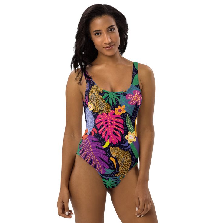 ABOUT Be beach ready in our In the Tropics One-Piece Swimsuit! The smooth fabric and flattering design hug your body, while the cheeky fit and scoop neckline make a statement. Whether by sea or pool, this swimsuit will make you feel invincible. Crafted out of 82% Polyester and 18% Spandex, this chlorine-resistant fabric features zig-zag stitching, double-layer front, and four-way stretch material for maximum comfort and mobility. Dare to be bold! DETAILS Chlorine-resistant fabric Cheeky fit with Beach Ready, Hug You, Be Bold, Zig Zag, Scoop Neckline, Make You Feel, One Piece Swimsuit, Double Layer, Stitching