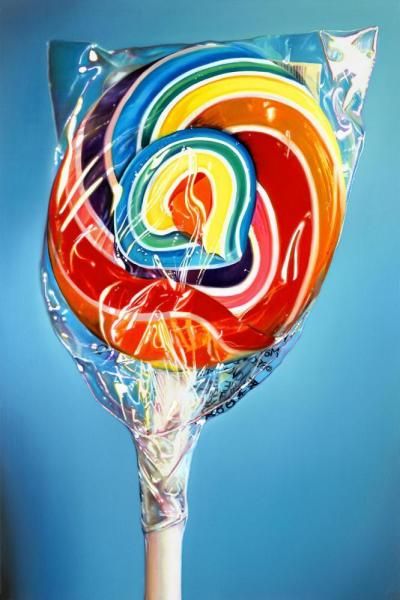 a lollipop candy on top of a blue background