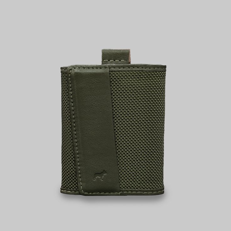 The Mini Version of the Ballistic Nylon Speed Wallet is as compact as it gets, designed to be durable, functional, and slim. Handcrafted from the world's finest materials, it provides smooth and fast access to every item inside. Features RFID blocking Top quality eco-friendly leather Ballistic nylon Magnetic closure Holds up to 12 cards* & 15 bills Dimensions: 63 x 86 x 6 mm Works with any currency 3 year warranty *Keep 3 cards per pocket minimum Chocolate Candle, Travel Capsule Wardrobe, Cowgirl Party, Kids Candy, Wallet For Men, Color Wow, Slim Wallet, American Pride, Leather Wallet Mens