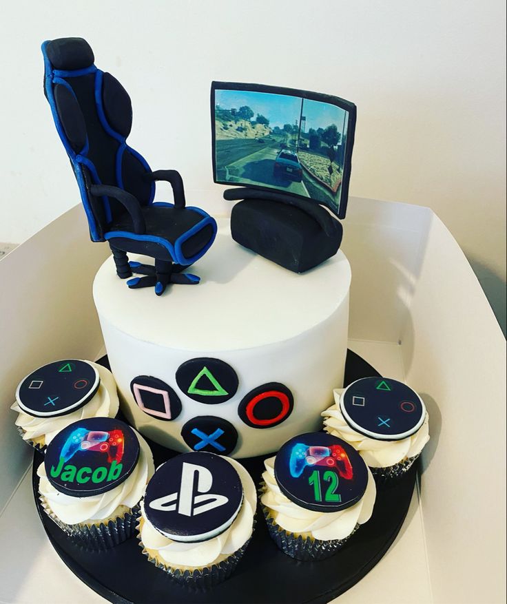 PlayStation gamer birthday cake and cupcakes with edible gaming chair and personalisation Gaming Cake Ideas, Gamer Birthday Cake, Gaming Cake, Playstation Cake, Cake Designs For Boy, Video Game Cakes, Gamer Birthday, 16 Birthday Cake