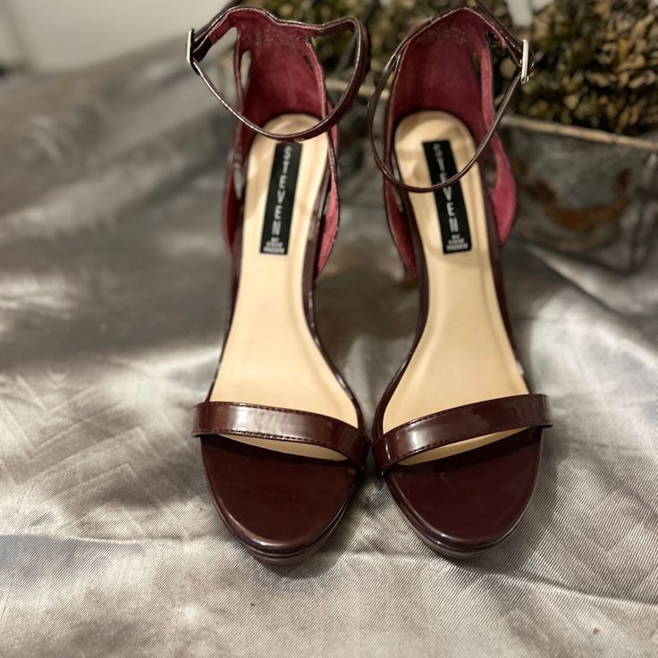 Sleek Patent Leather Wine Colored Heels Burgundy 4-inch Heels For Office, Sleek Red Open Toe Heels, Burgundy Platform Heels With Block Heel, Burgundy Block Heel Platform Shoes, Burgundy Open Toe Formal Sandals, Burgundy Open Toe Sandals For Formal Occasions, Formal Burgundy Ankle Strap Sandals, Formal Burgundy Open Toe Sandals, Burgundy Open Heel Party Heels