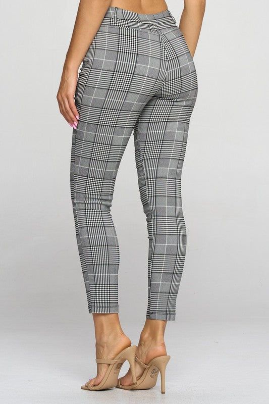 These plaid pants are your new go-to pair! They're charming and cute, without being too in your face. Great for working Moms, or on a day you want to be just a little bit dressier than the standard sweatpants! These pants will make your 🍑 your favorite asset! This black and white checkered pattern is a great new alternative to the buffalo plaid trend. Wear these with a monochromatic top, or spice it up and add color, you can't go wrong! Featuring a faux front pocket, double button front, and a Chic Stretch Plaid Bottoms, Trendy Non-stretch Plaid Bottoms, Trendy Plaid Ankle-length Bottoms, Trendy Ankle-length Plaid Bottoms, Plaid Stretch Trousers, Plaid Trend, Spice It Up, In Your Face, The Buffalo