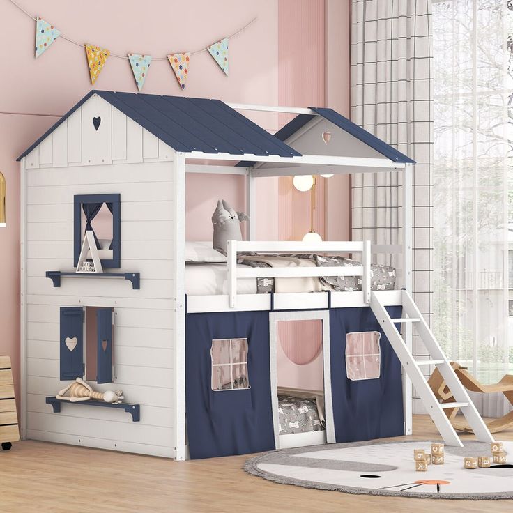 a child's bedroom with a white and blue bunk bed next to a pink wall