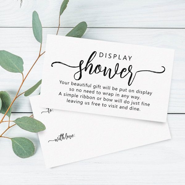 two cards with the words display shower written on them next to some eucalyptus leaves