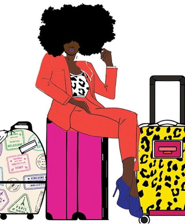 a woman sitting on top of a luggage bag next to two suitcases and a handbag