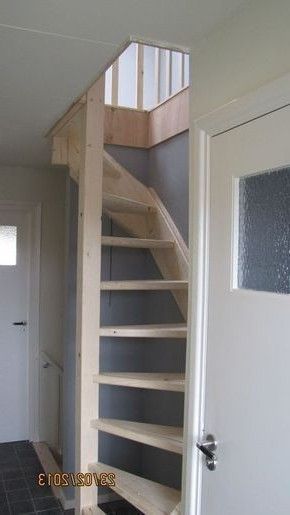 the stairs are built into the wall in this room, and there is no door