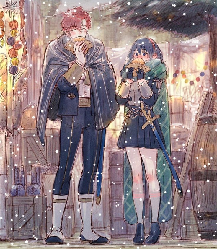 two people standing next to each other in the snow