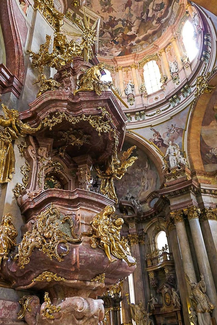 an ornately decorated church with gold and white decorations