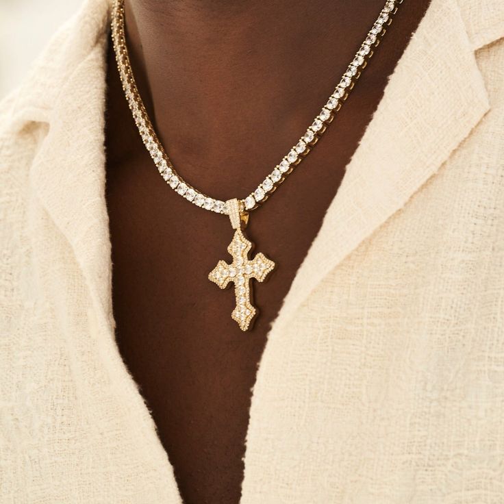 Introducing the Iced Gothic Cross in Yellow Gold - a bold addition to your pendant collection. Crafted with a durable 18k Gold and hand-set stones, this cross is guaranteed to make a statement. Pair this piece with our 5mm Tennis Chain in Yellow Gold for a complete, elevated look. This product is guaranteed for life - GLD will repair the item should you experience any defects in craftsmanship or breakage. Specifications - 35mm x 42mm (Width x Height) - Weight: (Weight can vary +/- 1 gram) - Gold Gothic Cross, Gothic Crosses, Tennis Chain, Vermeil Jewelry, Custom Earrings, Pendant Bracelet, Drop Necklace, Gold Design, Cz Stone