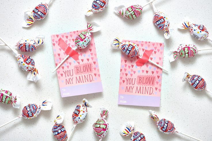 candy lollipops are arranged on a table with a card that says, you belong my mind